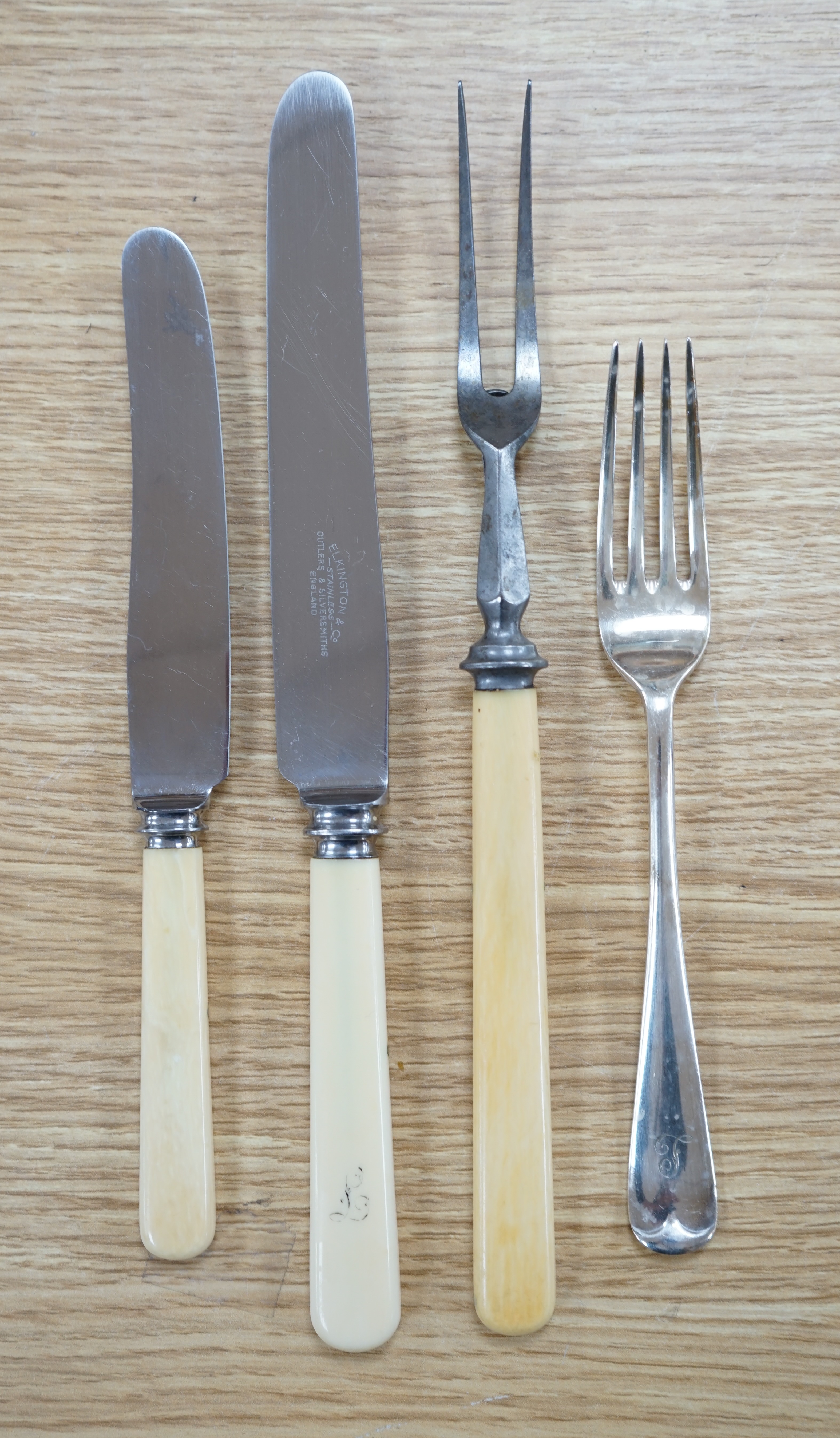 A large three layer oak canteen of plated Elkington and Co cutlery, Condition - good